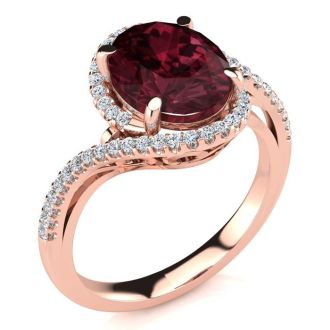 3 1/3 Carat Oval Shape Garnet and Halo Diamond Ring In 14 Karat Rose Gold