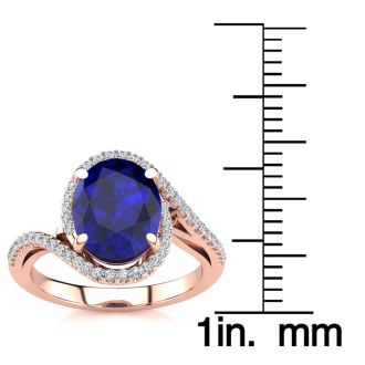3 1/3 Carat Oval Shape Sapphire and Halo Diamond Ring In 14 Karat Rose Gold