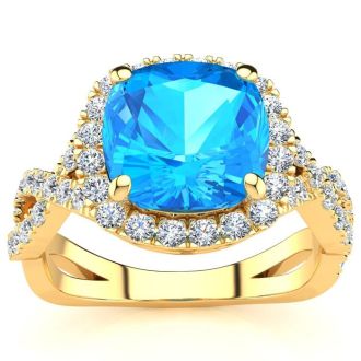 3 Carat Cushion Cut Blue Topaz and Halo Diamond Ring With Fancy Band In 14 Karat Yellow Gold