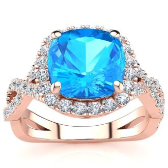 3 Carat Cushion Cut Blue Topaz and Halo Diamond Ring With Fancy Band In 14 Karat Rose Gold