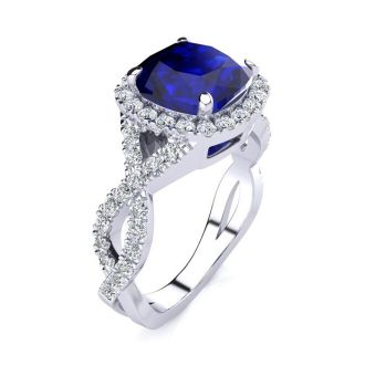 3 1/2 Carat Cushion Cut Sapphire and Halo Diamond Ring With Fancy Band In 14 Karat White Gold