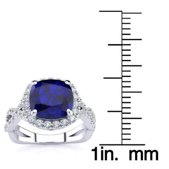 3 1/2 Carat Cushion Cut Sapphire and Halo Diamond Ring With Fancy Band In 14 Karat White Gold