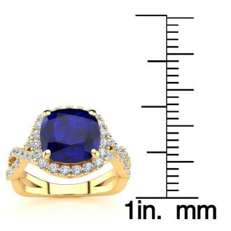3 1/2 Carat Cushion Cut Sapphire and Halo Diamond Ring With Fancy Band In 14 Karat Yellow Gold