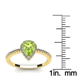 1 Carat Pear Shape Peridot and Halo Diamond Ring In 14 Karat Yellow Gold