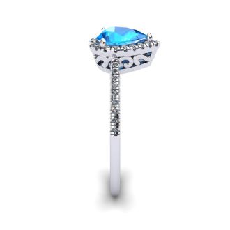 1 Carat Pear Shape Blue Topaz and Halo Diamond Ring In 14 Karat White Gold