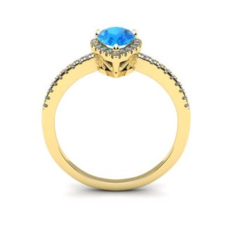 1 Carat Pear Shape Blue Topaz and Halo Diamond Ring In 14 Karat Yellow Gold