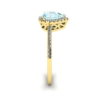 Aquamarine Ring: Aquamarine Jewelry: 3/4 Carat Pear Shape Aquamarine and Halo Diamond Ring In 14 Karat Yellow Gold