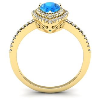 1 1/5 Carat Pear Shape Blue Topaz and Double Halo Diamond Ring In 14 Karat Yellow Gold