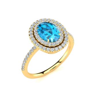 1 3/4 Carat Oval Shape Blue Topaz and Double Halo Diamond Ring In 14 Karat Yellow Gold
