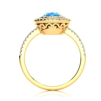 1 3/4 Carat Oval Shape Blue Topaz and Double Halo Diamond Ring In 14 Karat Yellow Gold