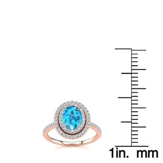 1 3/4 Carat Oval Shape Blue Topaz and Double Halo Diamond Ring In 14 Karat Rose Gold
