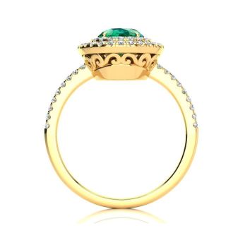 1 1/2 Carat Oval Shape Emerald and Double Halo Diamond Ring In 14 Karat Yellow Gold