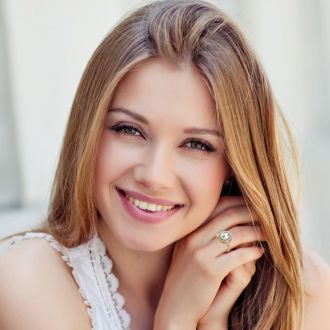 1 1/2 Carat Oval Shape Green Amethyst and Double Halo Diamond Ring In 14 Karat Yellow Gold