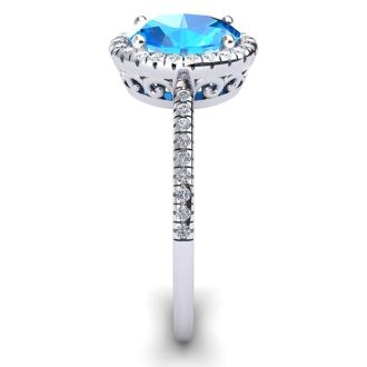 1 3/4 Carat Oval Shape Blue Topaz and Halo Diamond Ring In 14 Karat White Gold