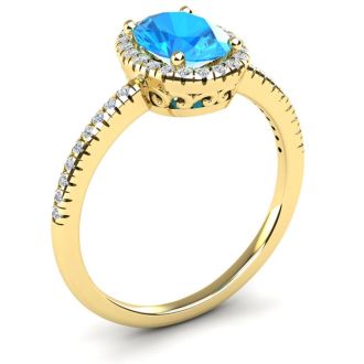 1 3/4 Carat Oval Shape Blue Topaz and Halo Diamond Ring In 14 Karat Yellow Gold