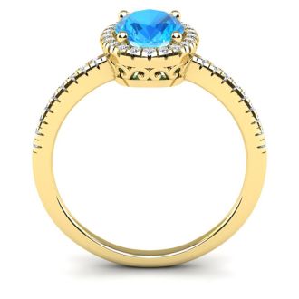 1 3/4 Carat Oval Shape Blue Topaz and Halo Diamond Ring In 14 Karat Yellow Gold