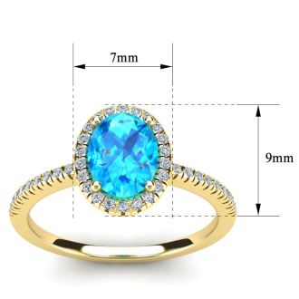 1 3/4 Carat Oval Shape Blue Topaz and Halo Diamond Ring In 14 Karat Yellow Gold