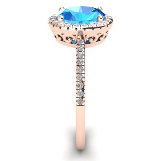 1 3/4 Carat Oval Shape Blue Topaz and Halo Diamond Ring In 14 Karat Rose Gold