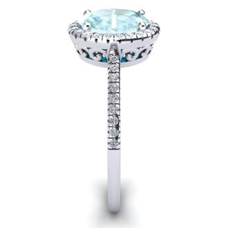 Aquamarine Ring: Aquamarine Jewelry: 1 1/3 Carat Oval Shape Aquamarine and Halo Diamond Ring In 14 Karat White Gold
