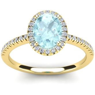 1 1/3 Carat Oval Shape Aquamarine and Halo Diamond Ring In 14 Karat Yellow Gold