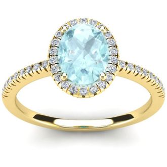 Aquamarine Ring: Aquamarine Jewelry: 1 1/3 Carat Oval Shape Aquamarine and Halo Diamond Ring In 14 Karat Yellow Gold