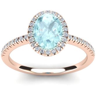 Aquamarine Ring: Aquamarine Jewelry: 1 1/3 Carat Oval Shape Aquamarine and Halo Diamond Ring In 14 Karat Rose Gold