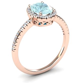 Aquamarine Ring: Aquamarine Jewelry: 1 1/3 Carat Oval Shape Aquamarine and Halo Diamond Ring In 14 Karat Rose Gold
