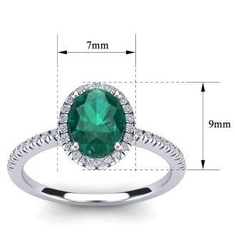 1 1/3 Carat Oval Shape Emerald and Halo Diamond Ring In 14 Karat White Gold