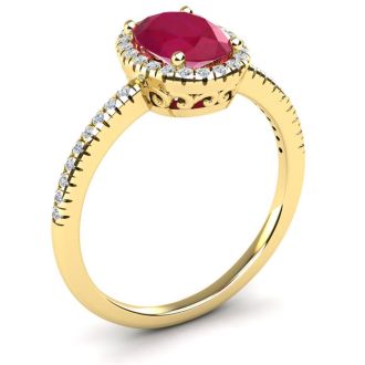 1 3/4 Carat Oval Shape Ruby and Halo Diamond Ring In 14 Karat Yellow Gold