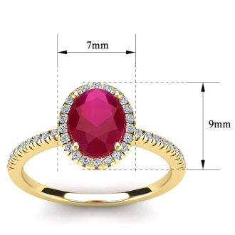 1 3/4 Carat Oval Shape Ruby and Halo Diamond Ring In 14 Karat Yellow Gold