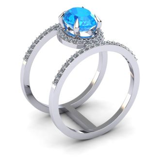 1 3/4 Carat Oval Shape Blue Topaz and Halo Diamond Spacer Ring In 14 Karat White Gold