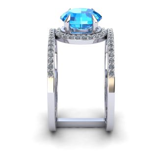 1 3/4 Carat Oval Shape Blue Topaz and Halo Diamond Spacer Ring In 14 Karat White Gold