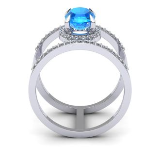 1 3/4 Carat Oval Shape Blue Topaz and Halo Diamond Spacer Ring In 14 Karat White Gold