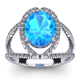 3 3/4 Carat Oval Shape Blue Topaz and Halo Diamond Ring In 14 Karat White Gold