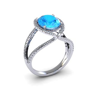 3 3/4 Carat Oval Shape Blue Topaz and Halo Diamond Ring In 14 Karat White Gold