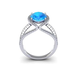 3 3/4 Carat Oval Shape Blue Topaz and Halo Diamond Ring In 14 Karat White Gold