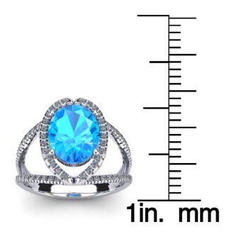 3 3/4 Carat Oval Shape Blue Topaz and Halo Diamond Ring In 14 Karat White Gold
