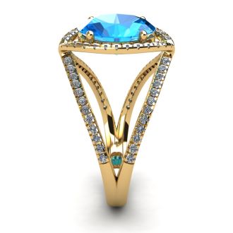 3 3/4 Carat Oval Shape Blue Topaz and Halo Diamond Ring In 14 Karat Yellow Gold