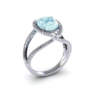 Aquamarine Ring: Aquamarine Jewelry: 2 3/4 Carat Oval Shape Aquamarine and Halo Diamond Ring In 14 Karat White Gold