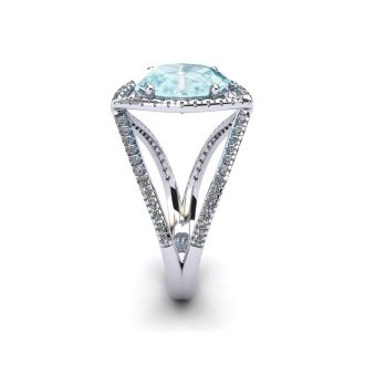 Aquamarine Ring: Aquamarine Jewelry: 2 3/4 Carat Oval Shape Aquamarine and Halo Diamond Ring In 14 Karat White Gold