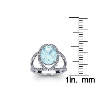 Aquamarine Ring: Aquamarine Jewelry: 2 3/4 Carat Oval Shape Aquamarine and Halo Diamond Ring In 14 Karat White Gold