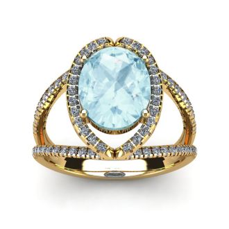 Aquamarine Ring: Aquamarine Jewelry: 2 3/4 Carat Oval Shape Aquamarine and Halo Diamond Ring In 14 Karat Yellow Gold
