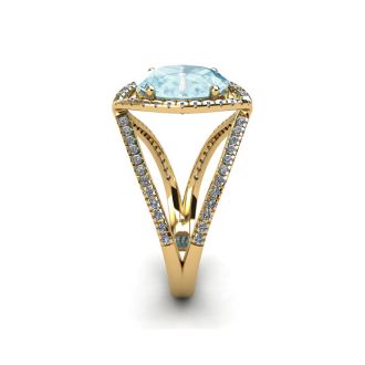 Aquamarine Ring: Aquamarine Jewelry: 2 3/4 Carat Oval Shape Aquamarine and Halo Diamond Ring In 14 Karat Yellow Gold