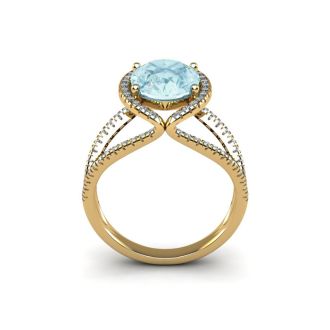 Aquamarine Ring: Aquamarine Jewelry: 2 3/4 Carat Oval Shape Aquamarine and Halo Diamond Ring In 14 Karat Yellow Gold