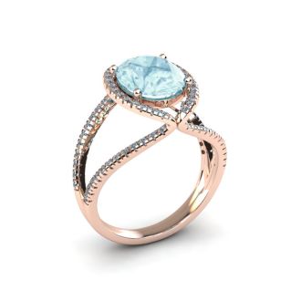 Aquamarine Ring: Aquamarine Jewelry: 2 3/4 Carat Oval Shape Aquamarine and Halo Diamond Ring In 14 Karat Rose Gold