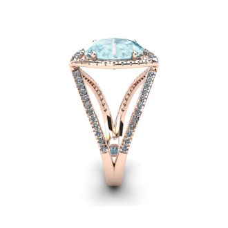 Aquamarine Ring: Aquamarine Jewelry: 2 3/4 Carat Oval Shape Aquamarine and Halo Diamond Ring In 14 Karat Rose Gold