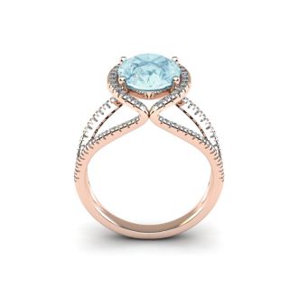 Aquamarine Ring: Aquamarine Jewelry: 2 3/4 Carat Oval Shape Aquamarine and Halo Diamond Ring In 14 Karat Rose Gold