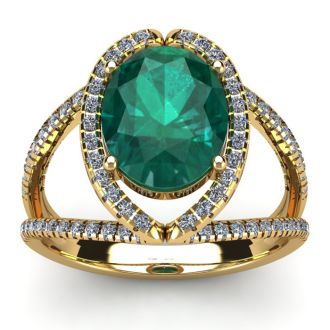 2 3/4 Carat Oval Shape Emerald and Halo Diamond Ring In 14 Karat Yellow Gold