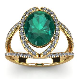 2 3/4 Carat Oval Shape Emerald and Halo Diamond Ring In 14 Karat Yellow Gold