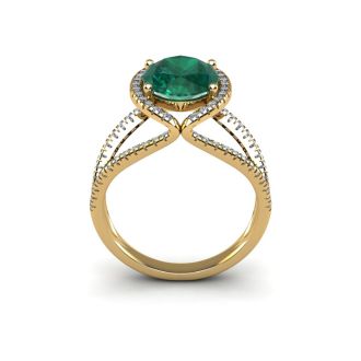 2 3/4 Carat Oval Shape Emerald and Halo Diamond Ring In 14 Karat Yellow Gold